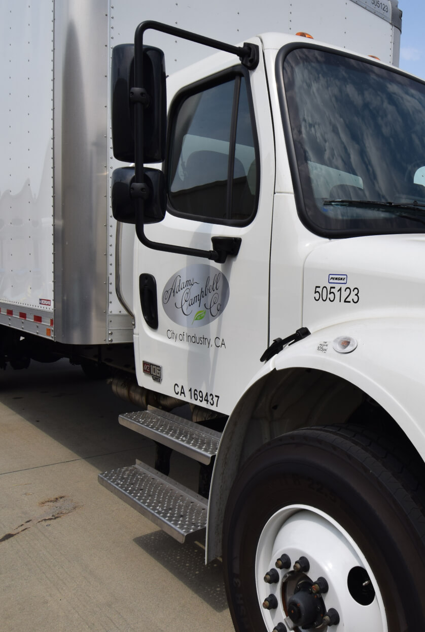 adams campbell box truck with logo on side door