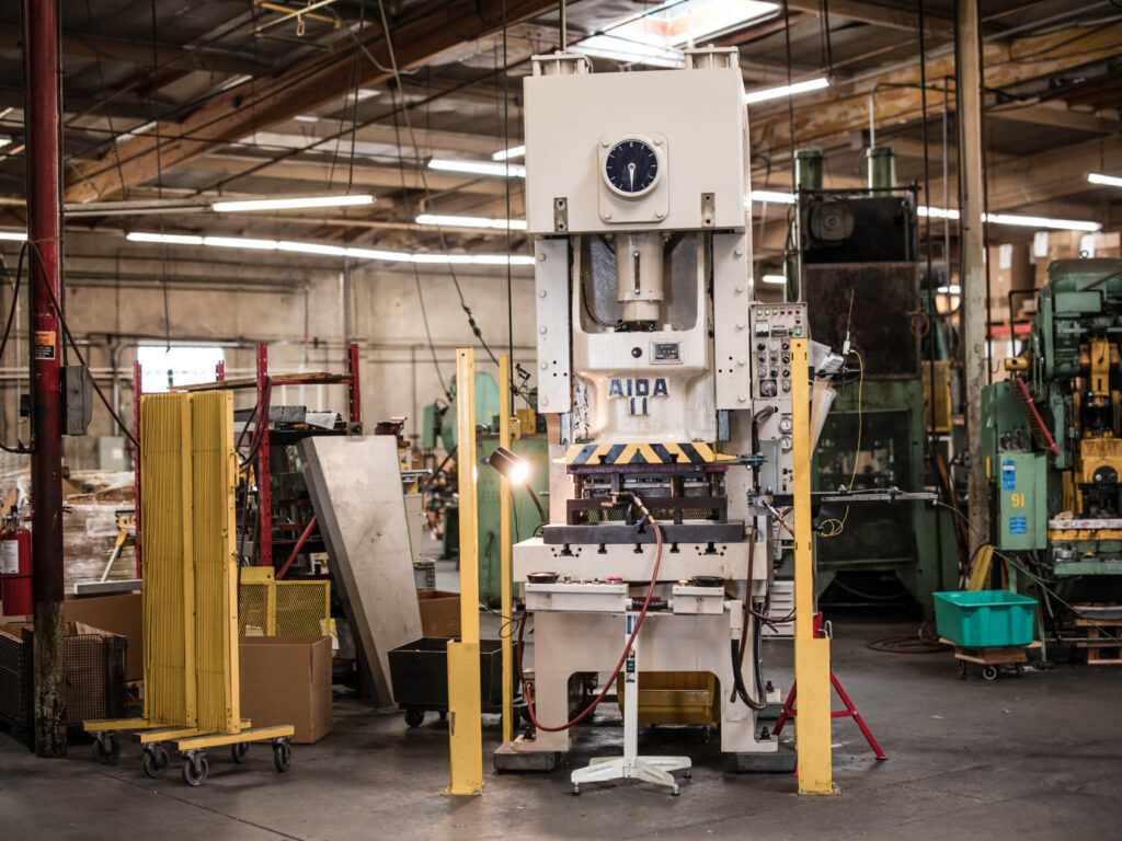 AIDA II mechanical press in the Adams Campbell manufacturing facility